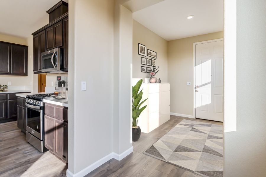 Entry with Peek to Kitchen - Virtually Staged
