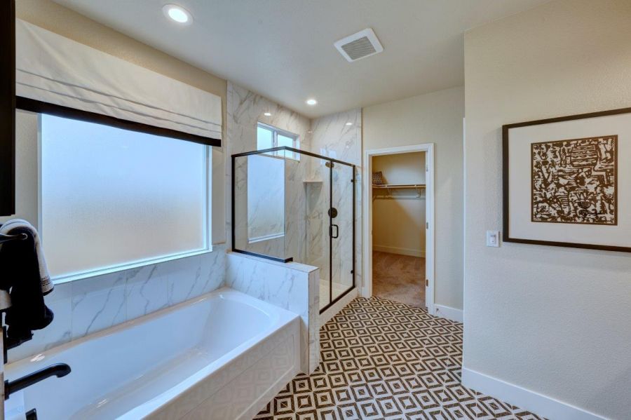 Primary Bath with Peek to Walk-in Closet